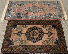 EASTERN STYLE WOOLLEN CARPETS (2), pink ground with opposing central pattern and bordered edgings,