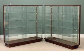 SHOP GLASS DISPLAY CABINETS, a pair, both having eight interior glass shelves and locking sliding