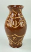 EWENNY POTTERY BALUSTER VASE with flared neck in brown glaze and trail decorated with ochre slip,