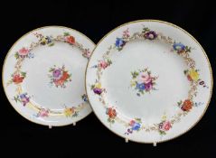 PAIR OF NANTGARW PORCELAIN PLATES, painted formally with arrangement of trailing flowers and centred