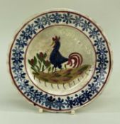 LLANELLY POTTERY COCKEREL TEA PLATE typically decorated with sponged daisy wheel border, 17.5cms