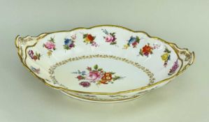 SWANSEA PORCELAIN TWIN-HANDLED OVAL CENTRE DISH, of fluted form, enamel decorated with a formal