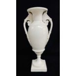 SWANSEA PORCELAIN VASE white glazed Blanc de Chine style, pedestal form, ovoid body, elaborate lotus