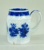 SWANSEA CAMBRIAN POTTERY CABBAGE LEAF MOULDED TANKARD with tapering neck, blue transfer 'Floral