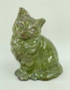 EWENNY CLAY PITS POTTERY MODEL OF A SEATED CAT in dark green glaze, sgraffito detail to face,