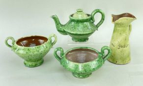 FOUR EWENNY POTTERY LIME GREEN GLAZED TABLEWARES comprising near pair of twin-handled sugar