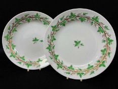 PAIR OF SWANSEA PORCELAIN PLATES, decorated with circling in gold and with green enamelled grapes