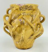 EWENNY POTTERY VASE BY HORACE ELLIOTT with multiple loop handles in yellow glaze overall,