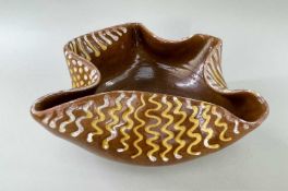 EWENNY POTTERY BOWL BY HORACE ELLIOTT, of crimped 'handkerchief' form, in brown glaze and