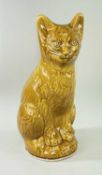 MODERN EWENNY POTTERY MODEL OF A SEATED CAT in mustard glaze, 36cms highProvenance: private