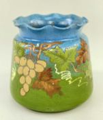 EWENNY POTTERY JARDINIERE, in a green and blue glaze decorated with grapevine and leaves, having a