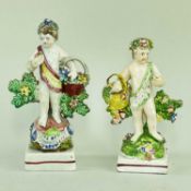RARE PAIR OF SWANSEA CAMBRIAN POTTERY PUTTI in the form of swag wearing flower pickers and their