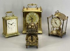 CLOCKS - A Smiths eight day lantern type clock, 18cms tall, Schatz anniversary type clock and two