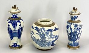CHINESE EARLY 20TH CENTURY CRACKLE GLAZE LIDDED VASES, a near pair, 27cms tall and a similar style