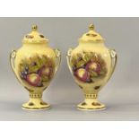 AYNSLEY TWIN-HANDLE PEDESTAL VASES a pair, Orchard Gold type - 23cms tall