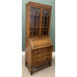 EARLY 20TH CENTURY POLISHED OAK BUREAU BOOKCASE - a fine example with twin glazed upper doors,