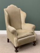 ANTIQUE WINGBACK ARMCHAIR - shaped crest back and foldover arms on ball and claw front supports,