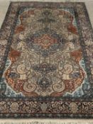 EASTERN WOOLLEN RUG - multi-coloured and multi-bordered with central diamond motif, 225 x 140cms