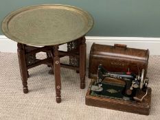 VINTAGE ASSORTMENT - cased Singer sewing machine and a Benares brass topped folding table, 52cms