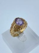 14K GOLD AMETHYST RING, of textured design, stamped 'Siffari', ring size T, 9.4gms Provenance: