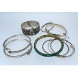 SILVER & WHITE METAL BANGLES comprising five marked silver, white metal filigree example, pair of