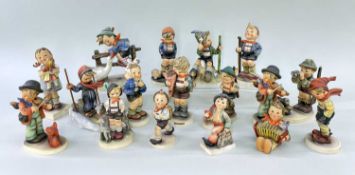ASSORTED HUMMEL GOEBEL PORCELAIN FIGURES OF CHILDREN, engaged in various sporting and recreational