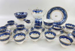 LATE 18TH CENTURY CAUGHLEY PORCELAIN PART TEA SERVICE, blue printed and gilt with Chinese diaper