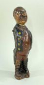 19TH CENTURY FOLK ART FIGURE, of a gent. in frock coat, painted details, inset glass eyes, 25cm h