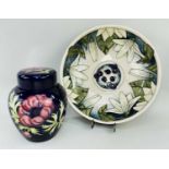 MOORCROFT POTTERY, comprising anemone jar and cover, base marked 'Trial', 12.10.94, 15.5cms high,