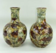 PAIR OF DOULTON LAMBETH VASES, decorated with Autumn leaves, impressed marks to bases and numbered