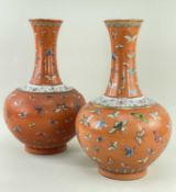 PAIR CHINESE FAMILLE ROSE 'BUTTERFLY' VASES, Guangxu 6-character mark in red, decorated on a coral