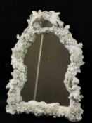 DRESDEN PORCELAIN MIRROR, moulded in the white with figures, birds and flowers, blue crossed