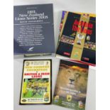 PRESENTATION CASE OF BRITISH LIONS RUGBY UNION MATCH PROGRAMMES from 2005 tour of New Zealand,