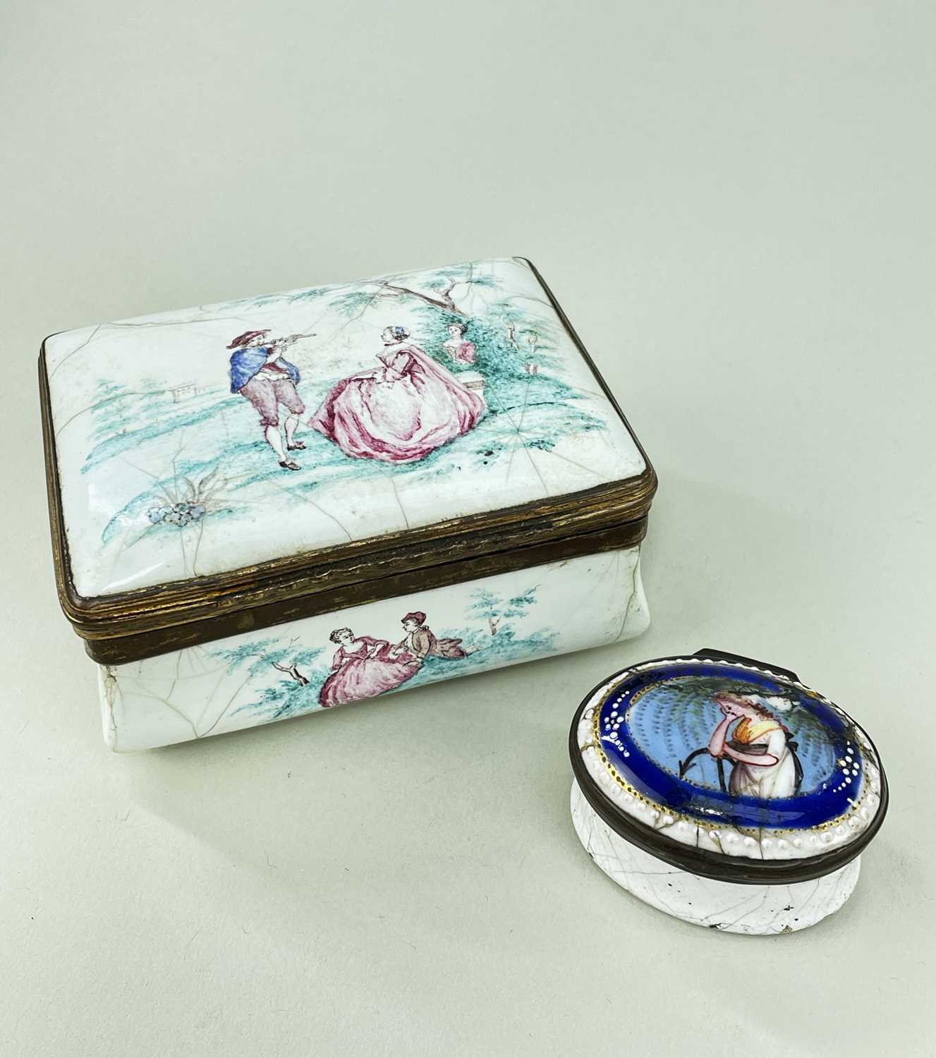 TWO 18th CENTURY ENAMEL BOXES, comprising South Staffordshire rectangular snuff box, painted with