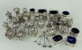 LARGE ASSORTMENT OF SILVER CRUETS, including two pairs of pepperettes, pair oval salts, 5-pc set