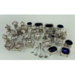 LARGE ASSORTMENT OF SILVER CRUETS, including two pairs of pepperettes, pair oval salts, 5-pc set