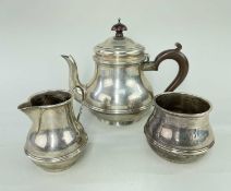 MATCHED THREE PIECE SILVER TEASET, Birmingham hallmarks, comprising teapot, cream jug and sucrier,