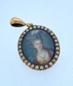 19TH CENTURY OVAL PENDANT ON LOOP, depicting hand-painted portrait of a lady within border of seed