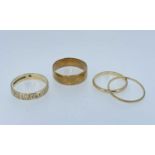 GOLD RINGS comprising two 18ct gold bands (4.0gms), together with two 9ct gold bands (3.8gms) (4)