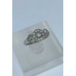 PLATINUM DIAMOND CLUSTER RING, set with nineteen graduated stones, ring size L, 4.8gms Provenance: