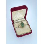 YELLOW GOLD RING, set with cabochon green gemstone, possibly chrysoprase, stamped '14k', ring size