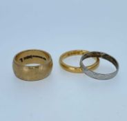 THREE WEDDING BANDS, comprising 22ct gold band (4.0gms), 9ct gold band (6.1gms), and a platinum band