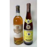 TWO BOTTLES OF FINE SWEET WINE comprising one bottle of 1983 Chateau Coutet, 1ere Cru Classé