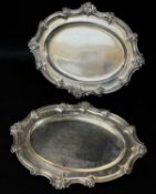 PAIR GEORGE III SILVER DISHES, William Burwash, London 1819, of rococo form, with C-scroll and