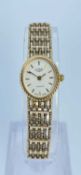 9CT GOLD LADIES ROTARY QUARTZ WRISTWATCH having integrated 9ct gold bracelet, 14.4gms, in Rotary box