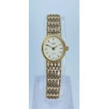 9CT GOLD LADIES ROTARY QUARTZ WRISTWATCH having integrated 9ct gold bracelet, 14.4gms, in Rotary box