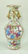 CANTONESE FAMILLE ROSE PORCELAIN BALUSTER VASE, mid 19th Century, painted with square panels of