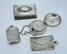 FOUR ANTIQUE COLLECTIBLES, including silver envelope stamp case monogrammed GEAJ, silver vesta