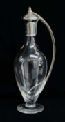 ELIZABETH II SILVER MOUNTED GLASS CLARET JUG, by Martyn Pugh, Birmingham 2000, the hinged cover with