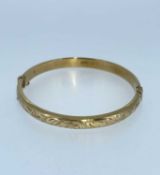 9CT GOLD ENGRAVED BANGLE, 10.4gms Provenance: private collection Vale of Glamorgan, consigned via